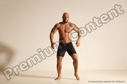 Underwear Gymnastic poses Man Black Muscular Bald Dancing Dynamic poses Academic